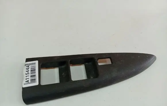 Nissan Note (E11) Front door window switch trim 809619U15A
