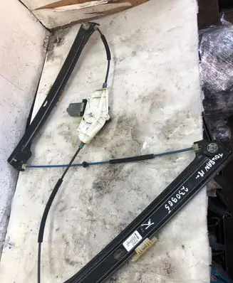 Volkswagen Touran III Front door window regulator with motor 0130822076