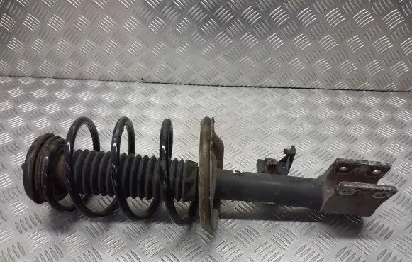 Citroen C4 I Front shock absorber with coil spring