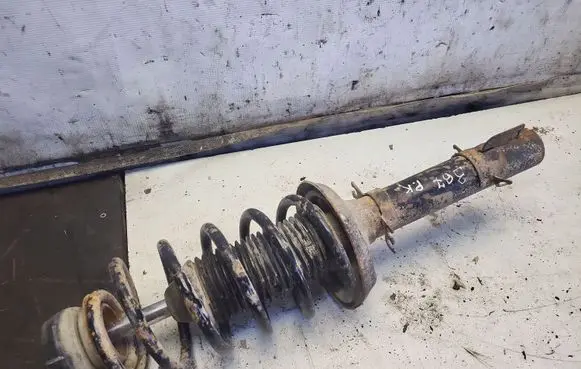 Volkswagen Golf IV Front shock absorber with coil spring 