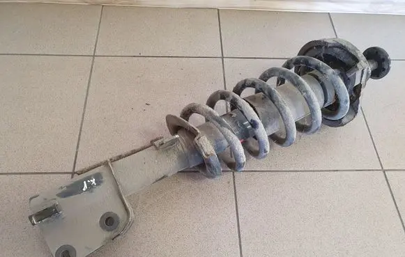 Opel Vivaro Front shock absorber with coil spring