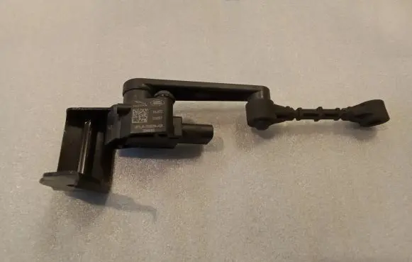 Land Rover Defender Headlight/headlamp level sensor JPLA3D026AB JPLA3D026