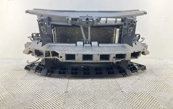 Radiator support slam panel