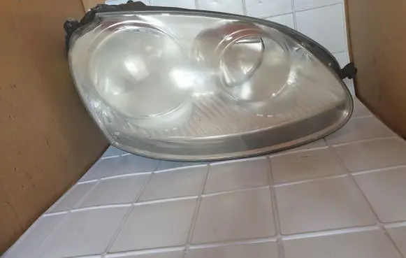 Volkswagen Golf V Headlight/headlamp 1K6941006Q 1LG24700712