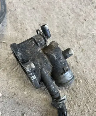Thermostat/thermostat housing