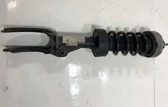 Volkswagen Touareg III Front shock absorber with coil spring 7P6412022EM