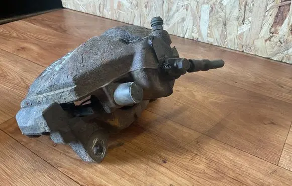 Volkswagen Caddy Front brake caliper 1K0615124E