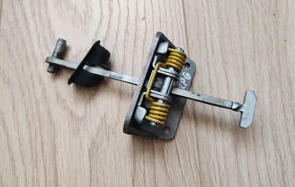 Rear door check strap stopper