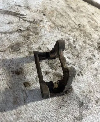 Volkswagen PASSAT B7 Brake caliper pad carrier rear 