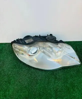 Volkswagen Touareg I Headlight/headlamp 7L6941032C