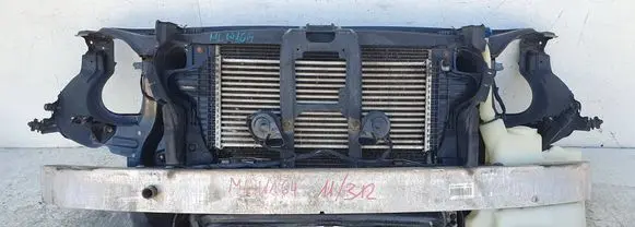 Radiator support slam panel