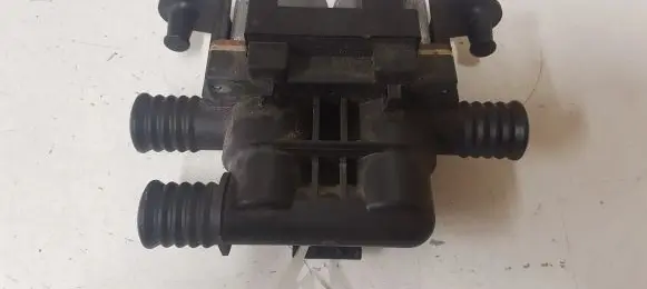 Coolant heater control valve