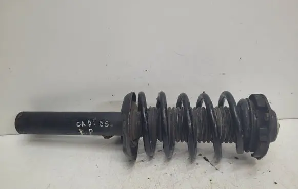 Volkswagen Caddy Front shock absorber with coil spring