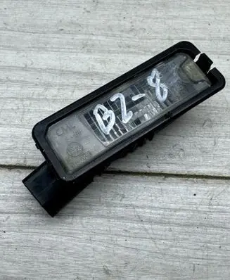 Volkswagen Golf V Number plate light 1K8943021