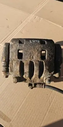Subaru Impreza II Front brake caliper