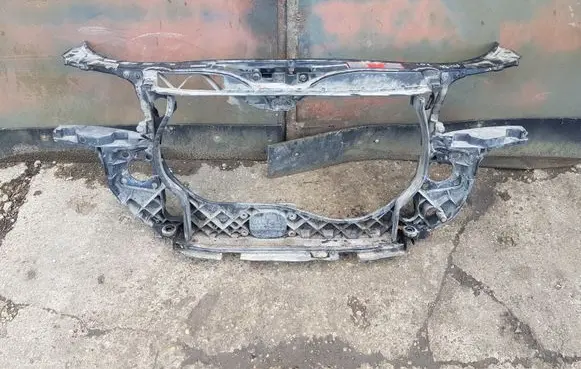 Radiator support slam panel
