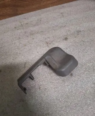 Subaru Legacy Front driver seat rail trim 