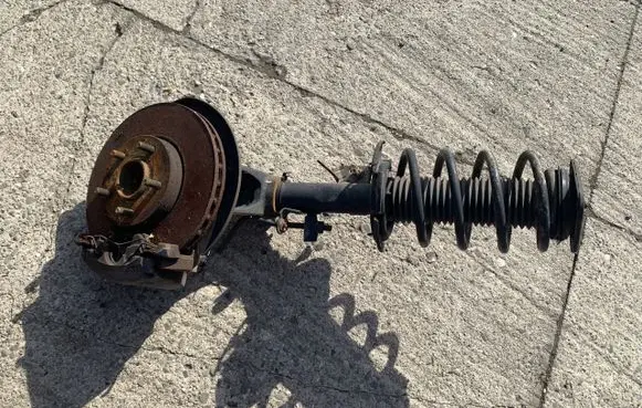 Ford Focus Front shock absorber with coil spring BV6118045LBB