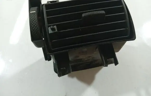 Dash center air vent grill