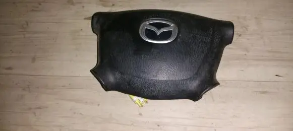 Mazda 323 F Steering wheel airbag b25f57k00 t93121a