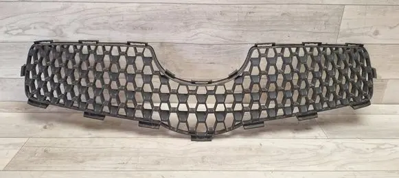 Toyota Yaris Front bumper upper radiator grill 