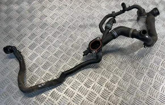 Volkswagen PASSAT B7 Engine coolant pipe/hose 03L121131AA