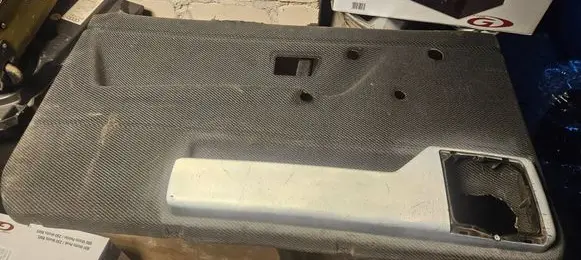 Volkswagen Golf II Front door card panel trim 191867011