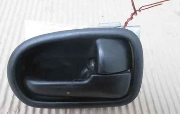 Mazda 323 Front door interior handle
