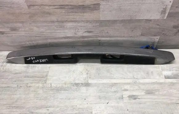 Trunk door license plate light bar
