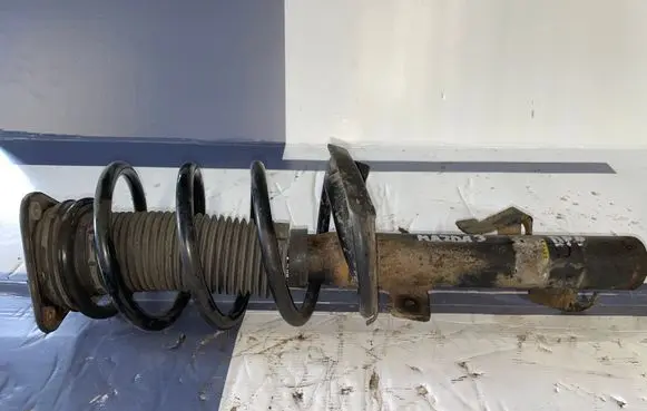 Mazda 3 I Front shock absorber with coil spring