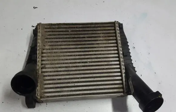 Volkswagen Touareg II Intercooler radiator 7P6145803D