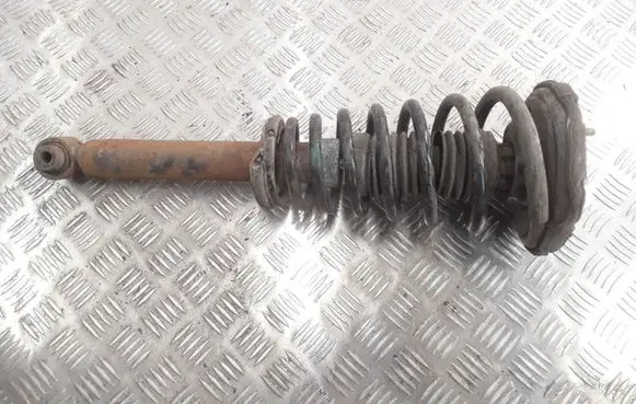 Nissan Primera Front shock absorber with coil spring