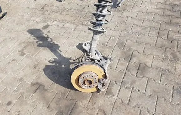 Front wheel hub spindle knuckle
