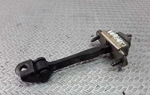 Front door check strap stopper