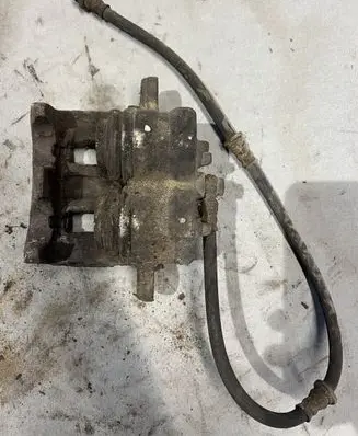 Mitsubishi Pajero Front brake caliper
