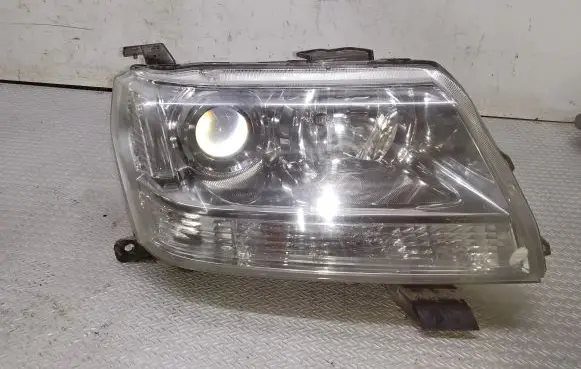 Suzuki Grand Vitara II Headlight/headlamp 10059079