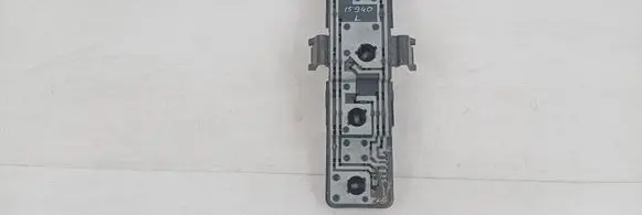 Tail light bulb cover holder