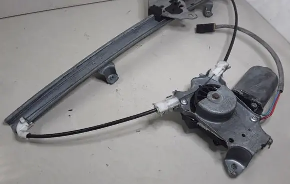 Nissan Primera Front door window regulator with motor 112440