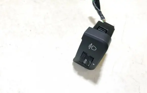 Headlight level height control switch