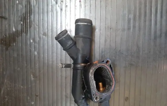 Thermostat/thermostat housing