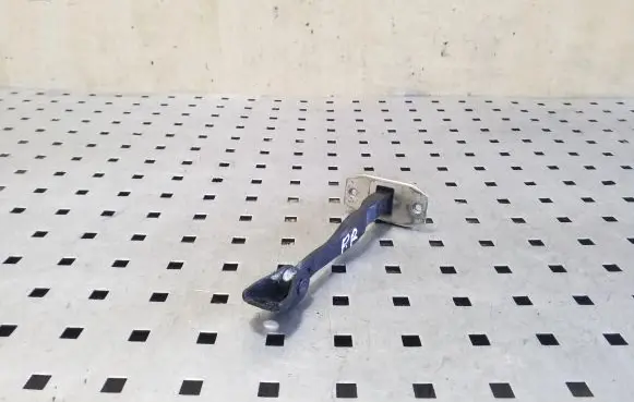 Front door check strap stopper