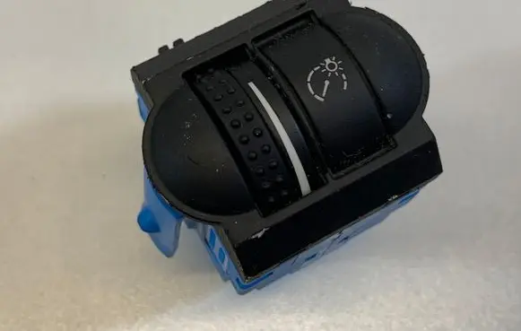 Panel lighting control switch