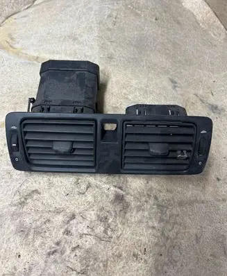 Dash center air vent grill