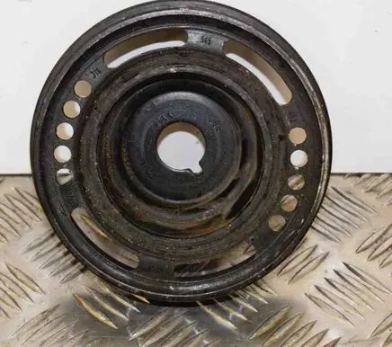 Opel Astra J Crankshaft pulley 55559328