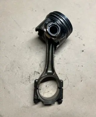 Piston with connecting rod