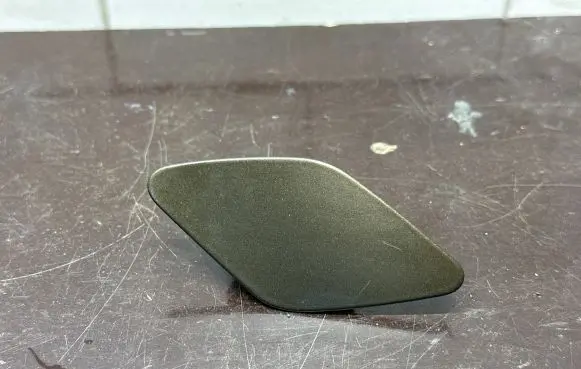 Headlight washer spray nozzle cap/cover