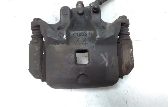 Nissan Juke I F15 Front brake caliper 1203