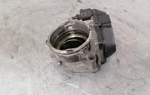 Volkswagen Touran I Throttle valve 03G128063Q