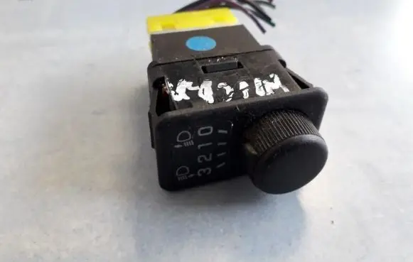 Headlight level height control switch