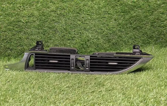 Dash center air vent grill